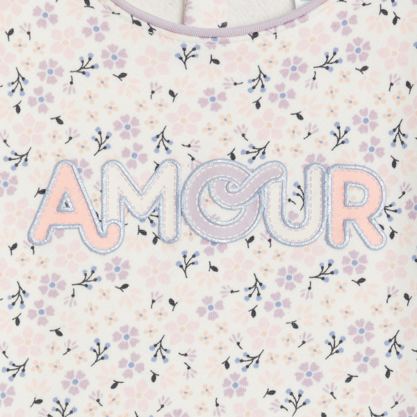 سترة من الصوف الناعم منمقة برسوم، باللون الأبيض للفتيات الصغيرات